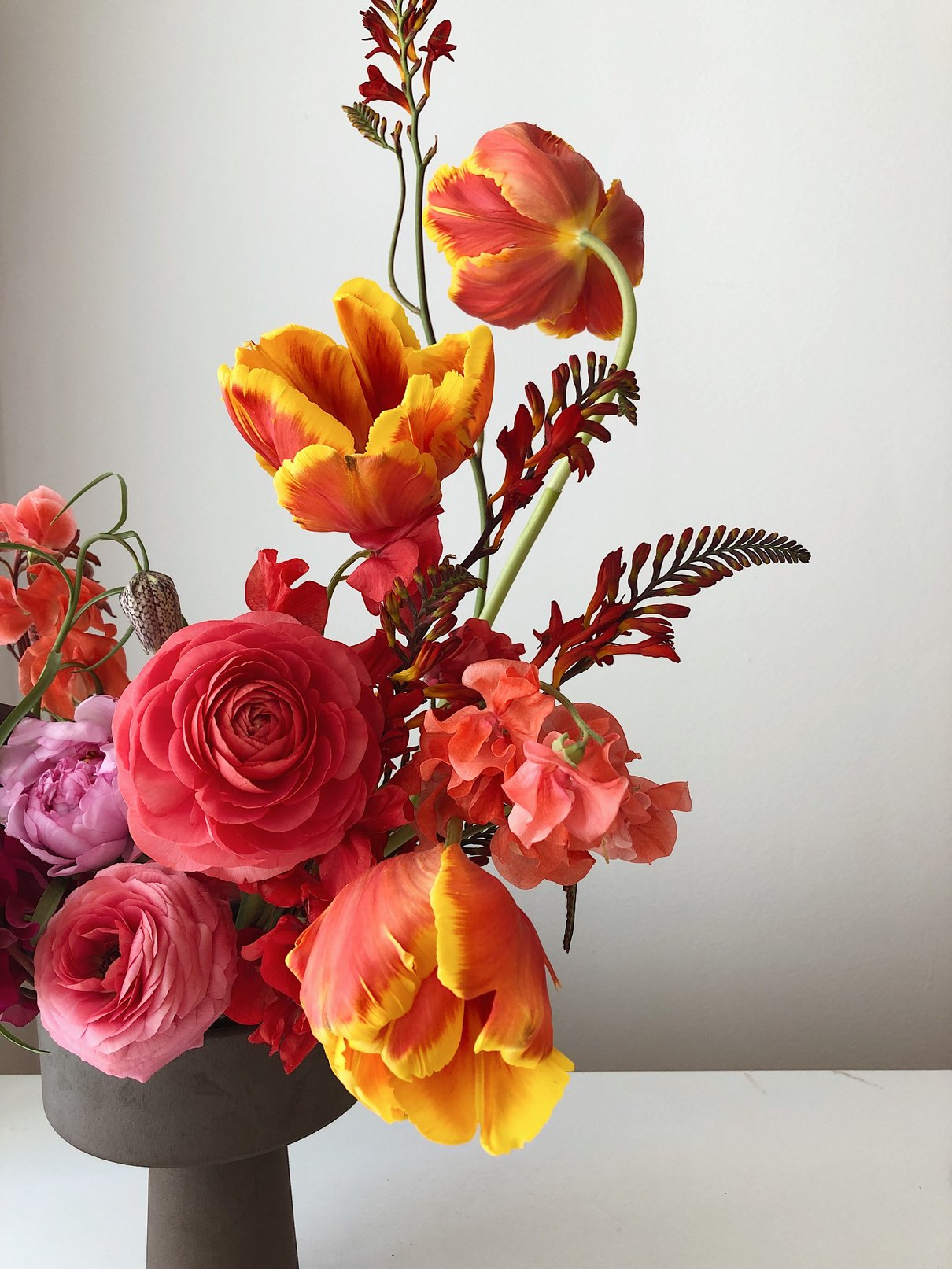 Colorful spring bouquet in modern vase